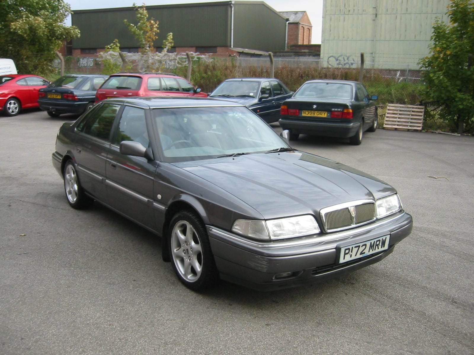 A grey 1996 Rover 800 Vitesse Sport fastback with a UK registration in a car park