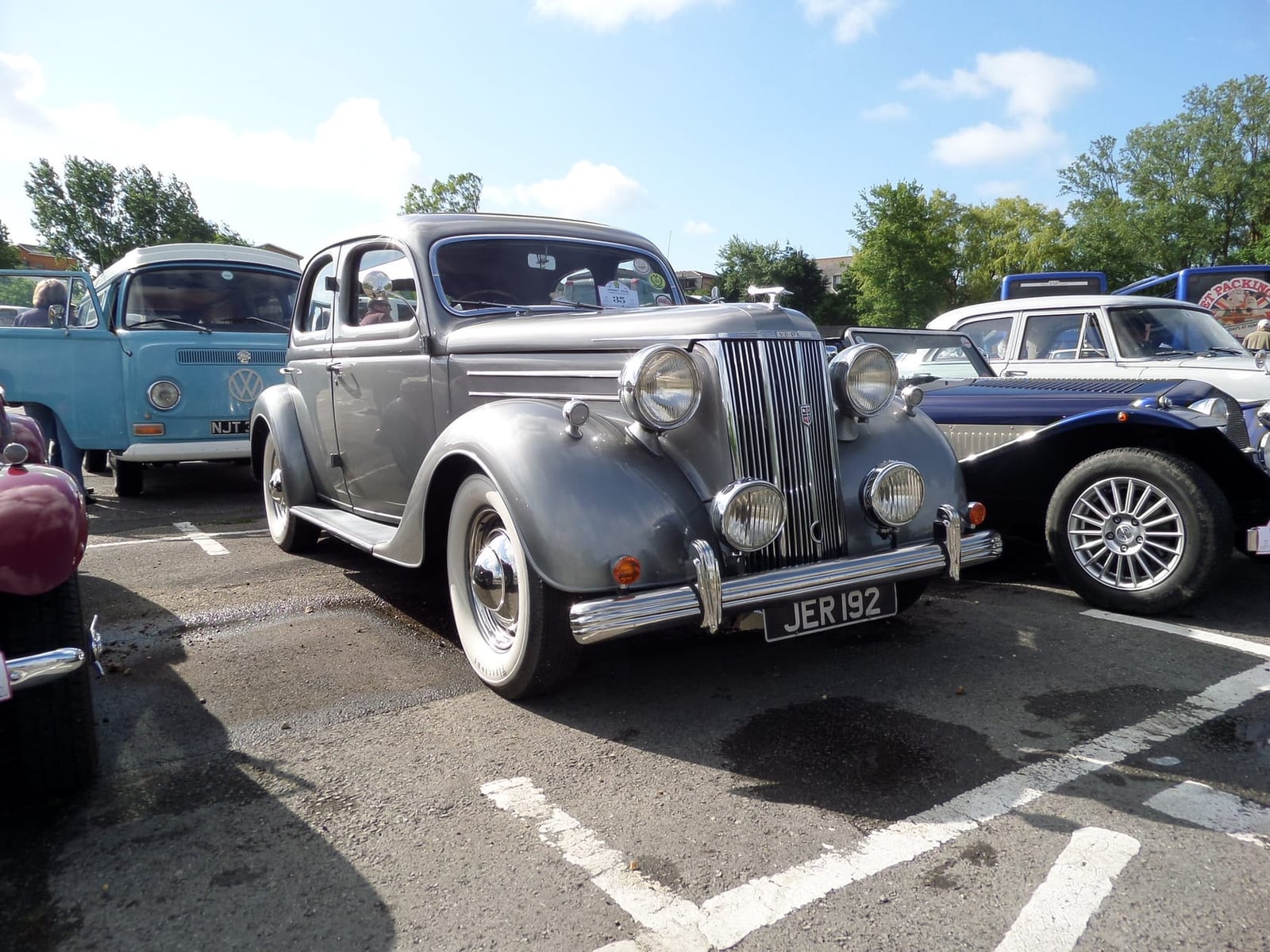 A grey Ford V8 Pilot at a classic car show, front three-quarter view, UK registration JER 192