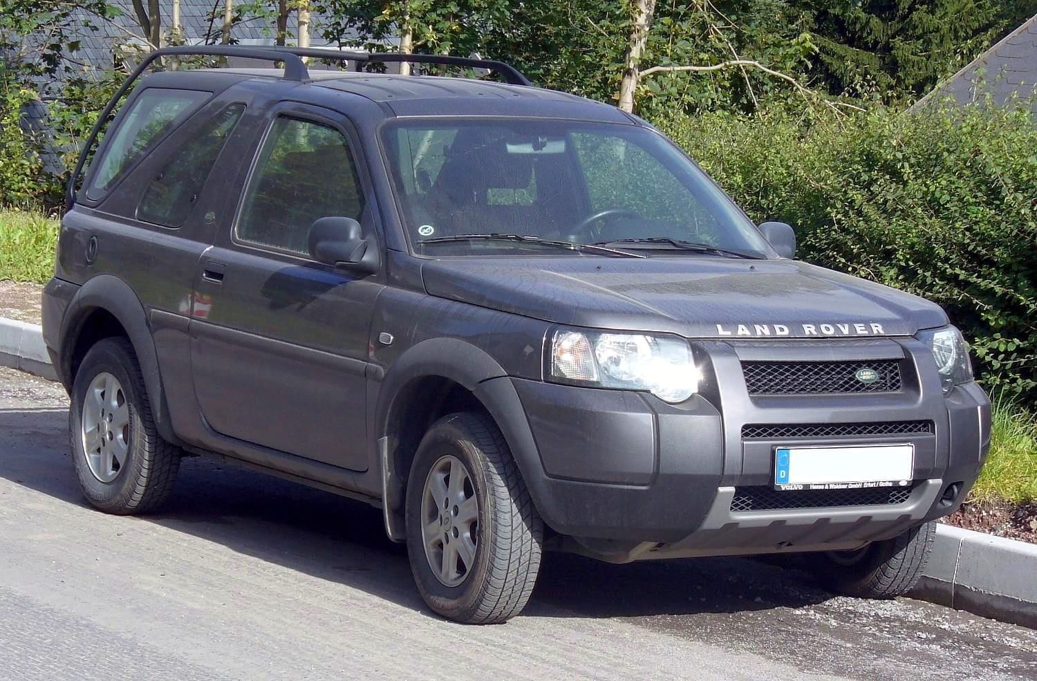 A grey facelift Land Rover Freelander three-door Hardback parked on a kerb