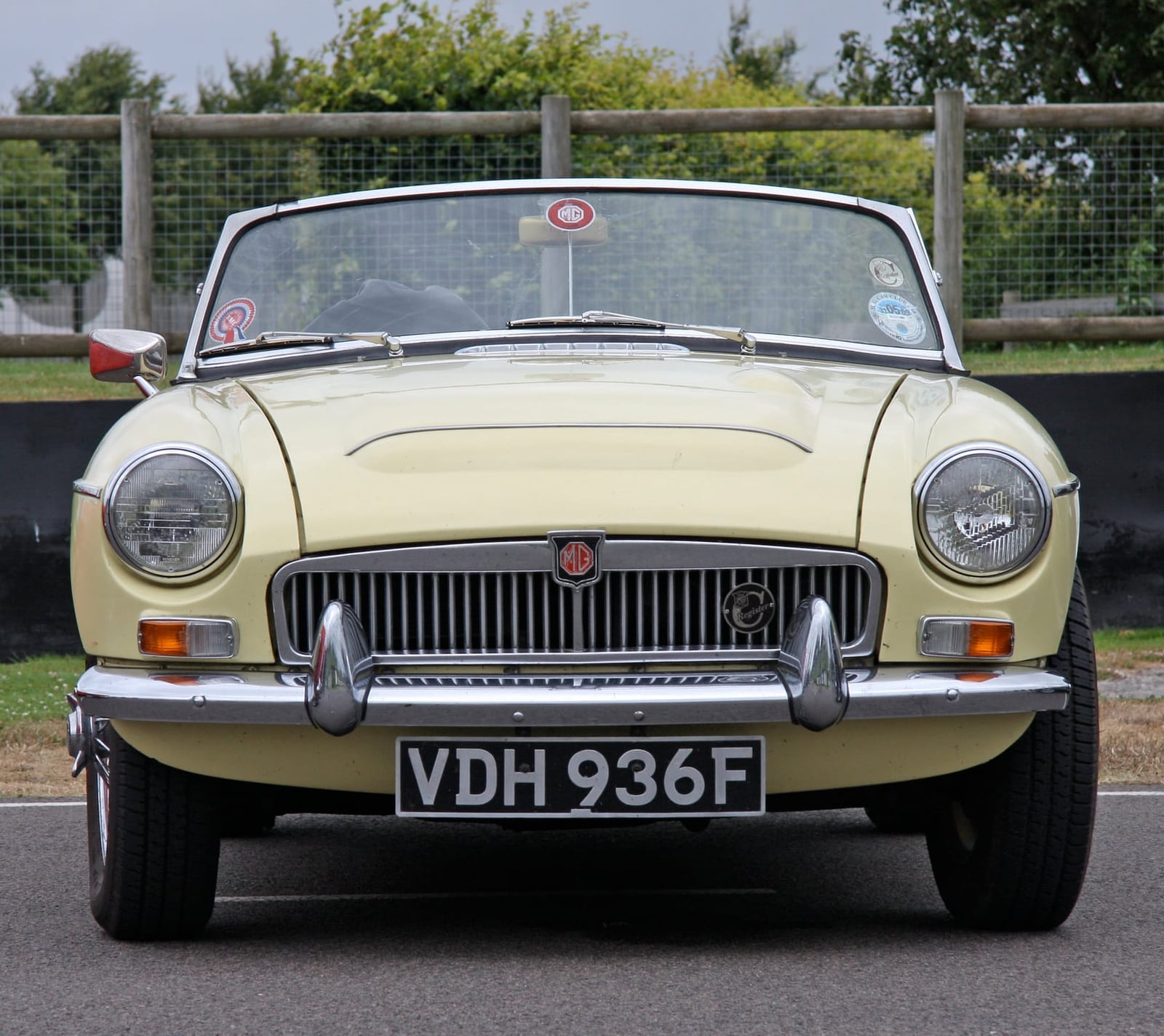 A cream MG MGC GT, front view