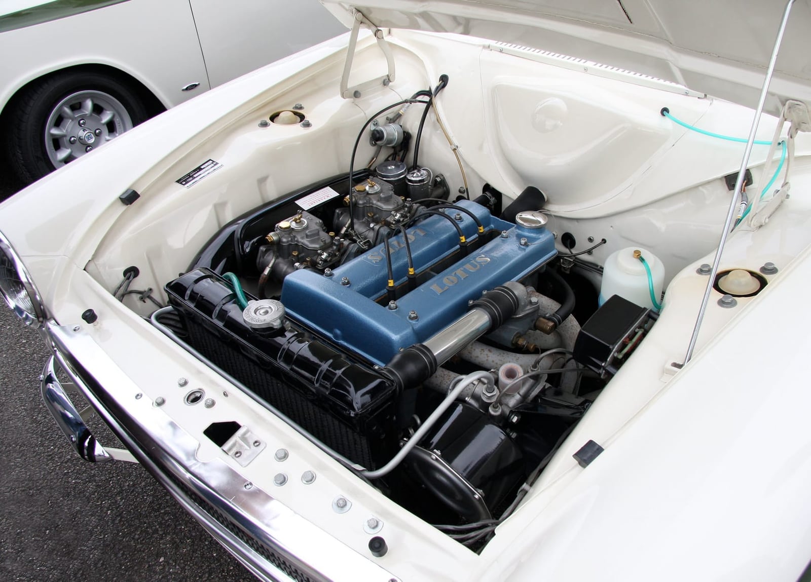 The engine bay of a Mk1 Lotus Cortina showing the Lotus twin-cam engine